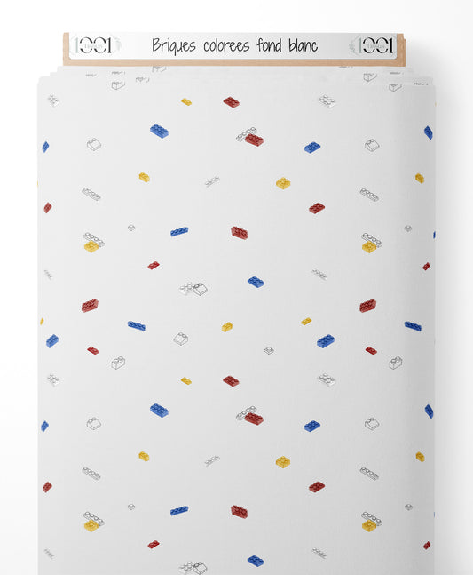 Tissu - Briques colorées sur fond blanc
