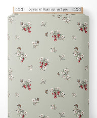 Tissu - Cerises et fleurs sur vert pâle