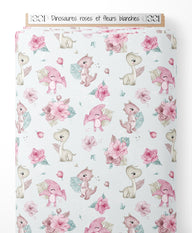 Tissu - Dinosaures roses et fleurs blanches