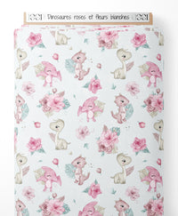 Tissu - Dinosaures roses et fleurs blanches