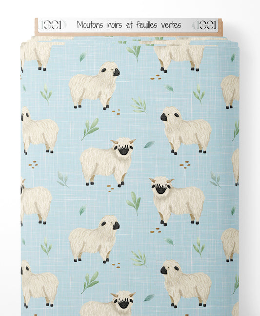 Tissu - Moutons noirs et feuilles vertes