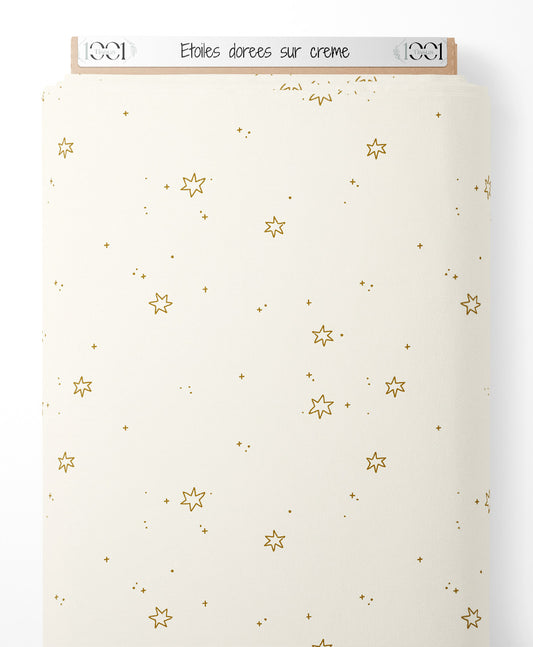 Tissu - Étoiles dorées sur crème