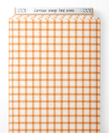 Tissu - Carreaux orange sur fond crème