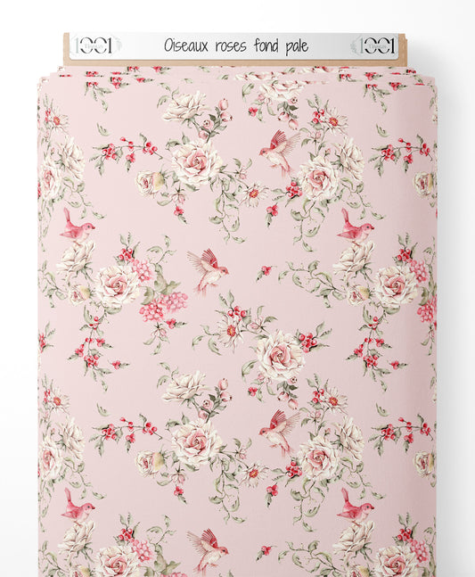 Tissu - Oiseaux roses sur fond pâle