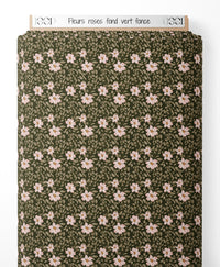 Tissu - Fleurs roses sur fond vert foncé