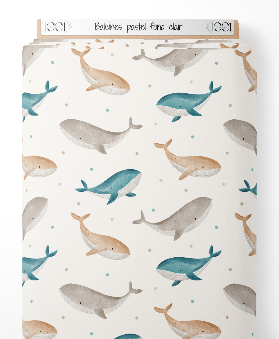 Tissu - Baleines pastel sur fond clair