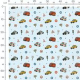 Tissu - Véhicules sur fond bleu clair