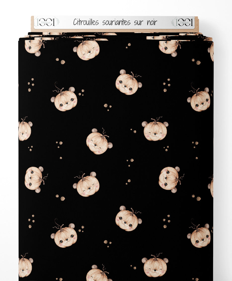 Tissu - Citrouilles souriantes sur noir