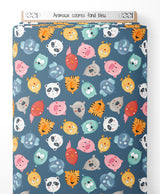 Tissu - Animaux colorés sur fond bleu