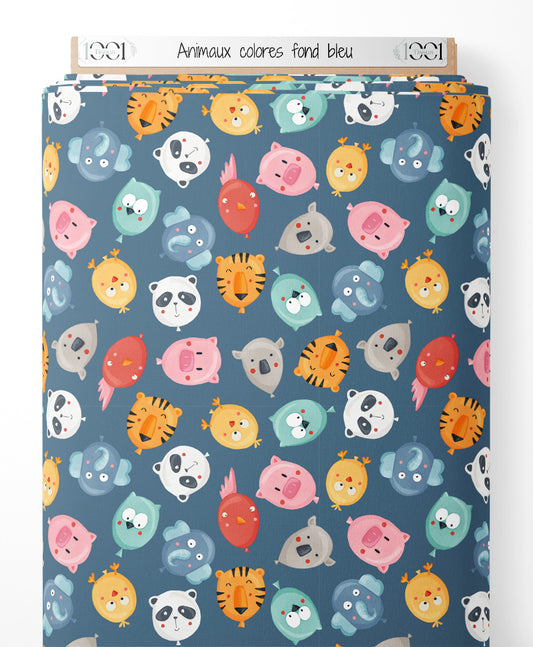 Tissu - Animaux colorés sur fond bleu