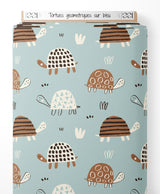 Tissu - Tortues géométriques sur bleu