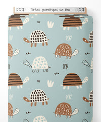 Tissu - Tortues géométriques sur bleu