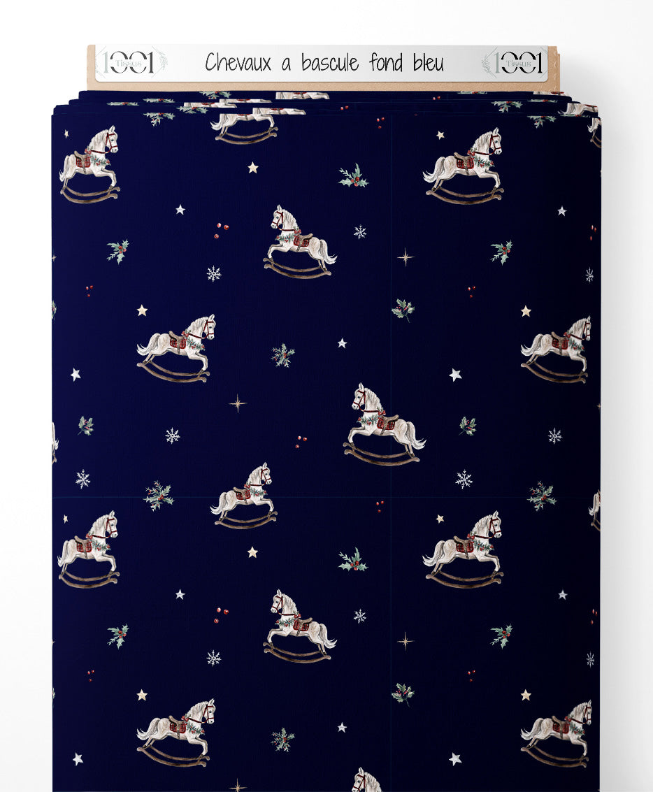 Tissu - Chevaux à bascule sur fond bleu