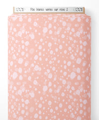 Tissu - Pois blancs variés sur rose 2