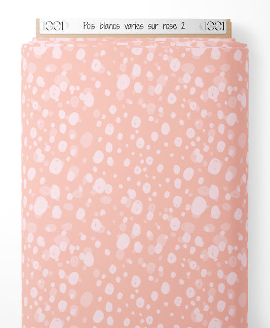 Tissu - Pois blancs variés sur rose 2