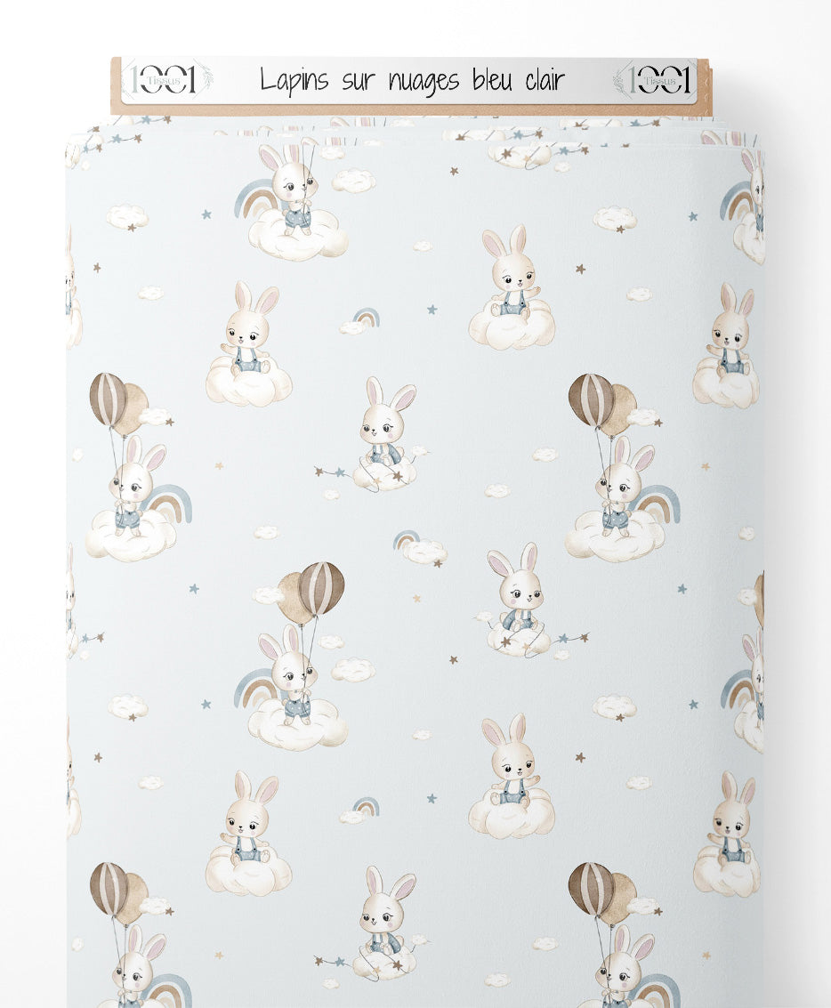 Tissu - Lapins sur nuages bleu clair