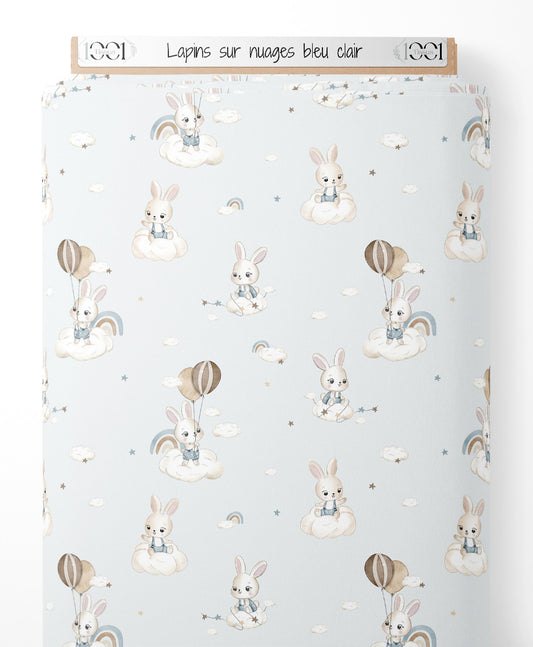 Tissu - Lapins sur nuages bleu clair