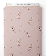 Tissu - Lapins roses sur fond beige