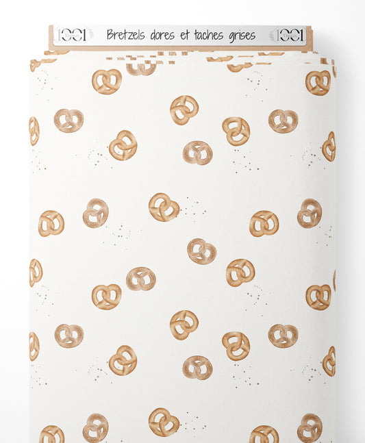 Tissu - Bretzels dorés et taches grises