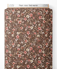 Tissu - Fleurs roses sur fond marron