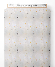 Tissu - Étoiles variées sur gris clair