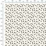 Tissu - Pois noirs irréguliers sur blanc