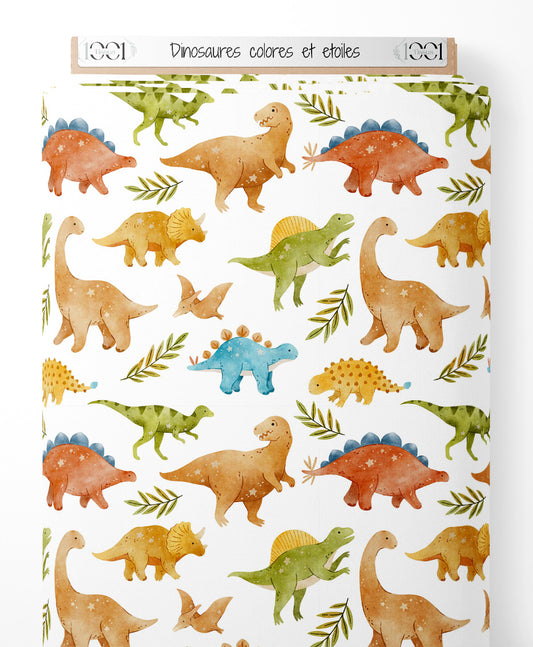 Tissu - Dinosaures colorés et étoiles