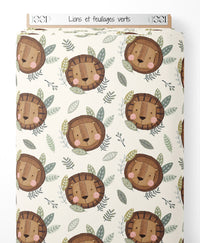 Tissu - Lions et feuillages verts