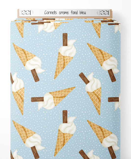 Tissu - Cornets crème sur fond bleu