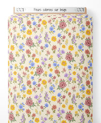 Tissu - Fleurs colorées sur beige