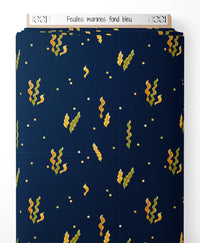 Tissu - Feuilles marines sur fond bleu