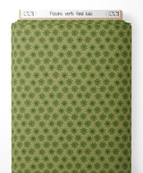 Tissu - Flocons verts sur fond kaki