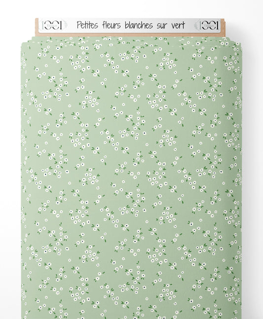 Tissu - Petites fleurs blanches sur vert