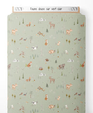 Tissu - Faune douce sur vert clair