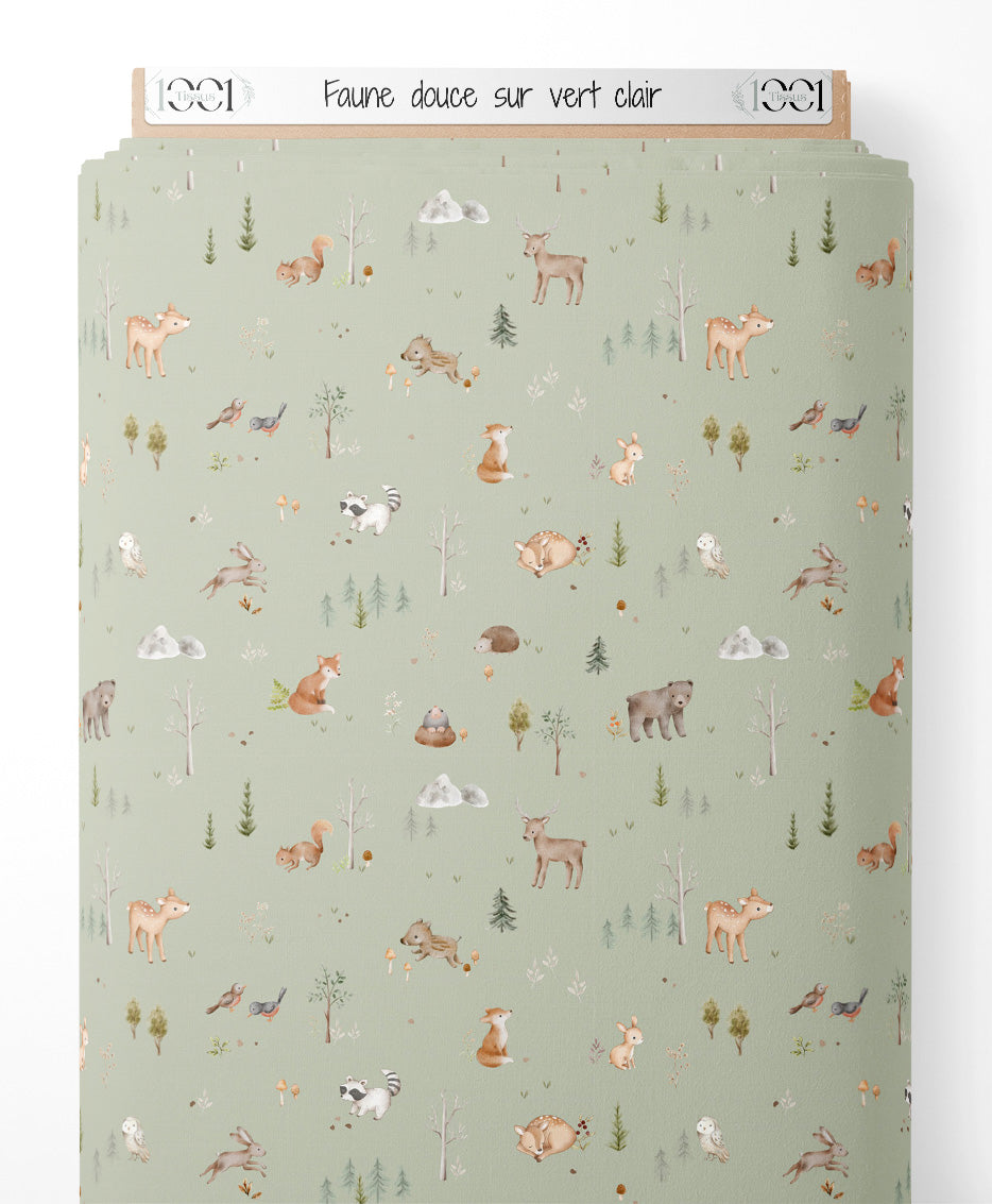 Tissu - Faune douce sur vert clair