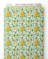 Tissu - Citrons et oranges sur vert