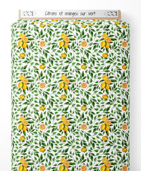 Tissu - Citrons et oranges sur vert