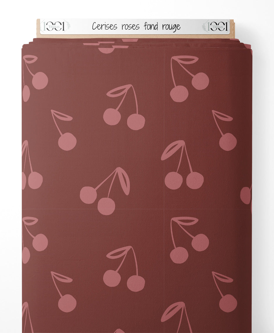 Tissu - Cerises roses sur fond rouge