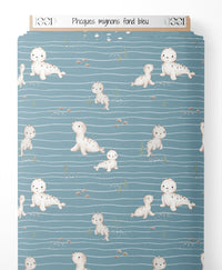Tissu - Phoques mignons sur fond bleu