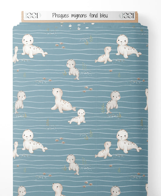 Tissu - Phoques mignons sur fond bleu