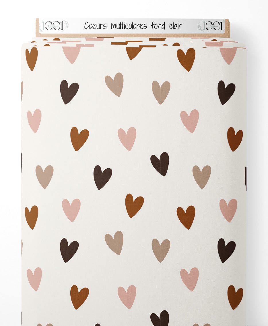Tissu - Cœurs multicolores sur fond clair