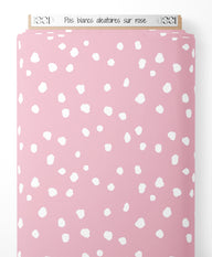 Tissu - Pois blancs aléatoires sur rose