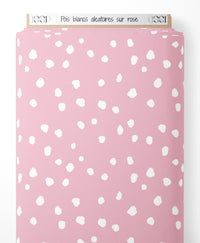Tissu - Pois blancs aléatoires sur rose