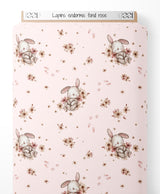Tissu - Lapins endormis sur fond rose