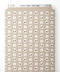 Tissu - Crânes blancs sur fond beige