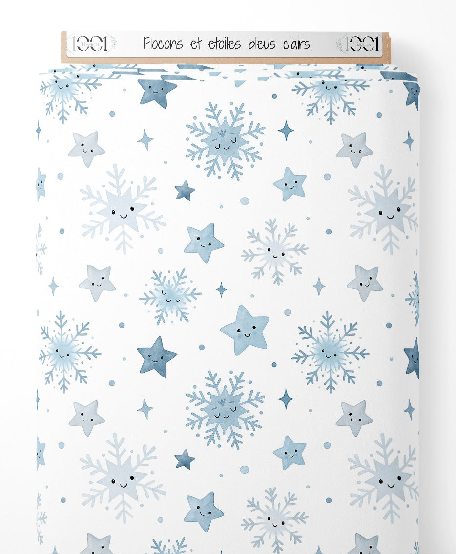 Tissu - Flocons et étoiles bleus clairs