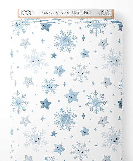 Tissu - Flocons et étoiles bleus clairs