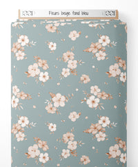 Tissu - Fleurs beige sur fond bleu