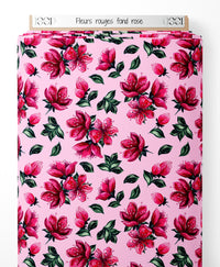 Tissu - Fleurs rouges sur fond rose