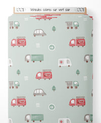 Tissu - Véhicules colorés sur vert clair